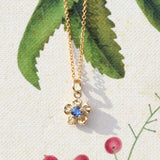 sapphire forget me not necklace in gold