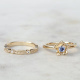 forget me not flower engagement ring with a diamond leaf wedding band