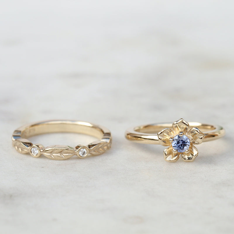 forget me not flower engagement ring with a diamond leaf wedding band