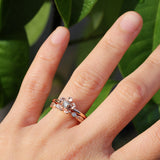 Forget me not flower engagement ring with a diamond leaf wedding band