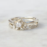 forget me not flower ring and diamond leaf ring in white gold