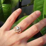 rose gold rose ring with a diamond