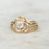 diamond rose engagement ring and leaf wedding ring