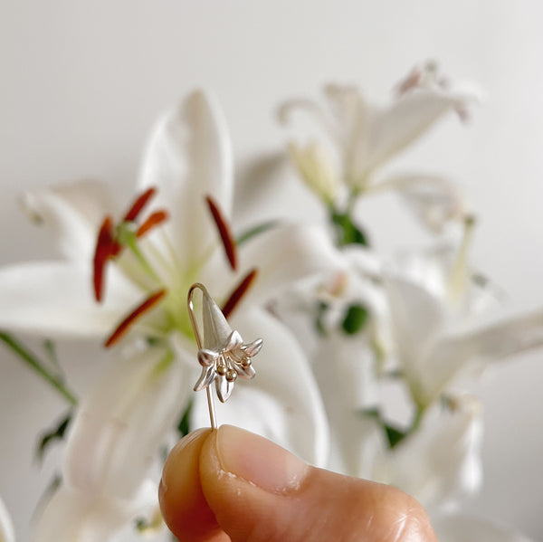 lily flower earrings in gold and silver