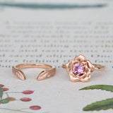 rose engagement ring and leaf wedding ring
