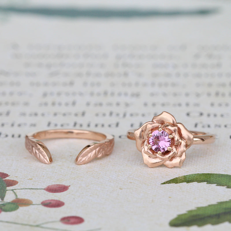 rose engagement ring and leaf wedding ring