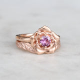 rose engagement ring and leaf wedding ring