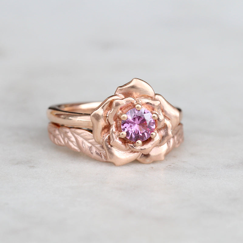 rose engagement ring and leaf wedding ring