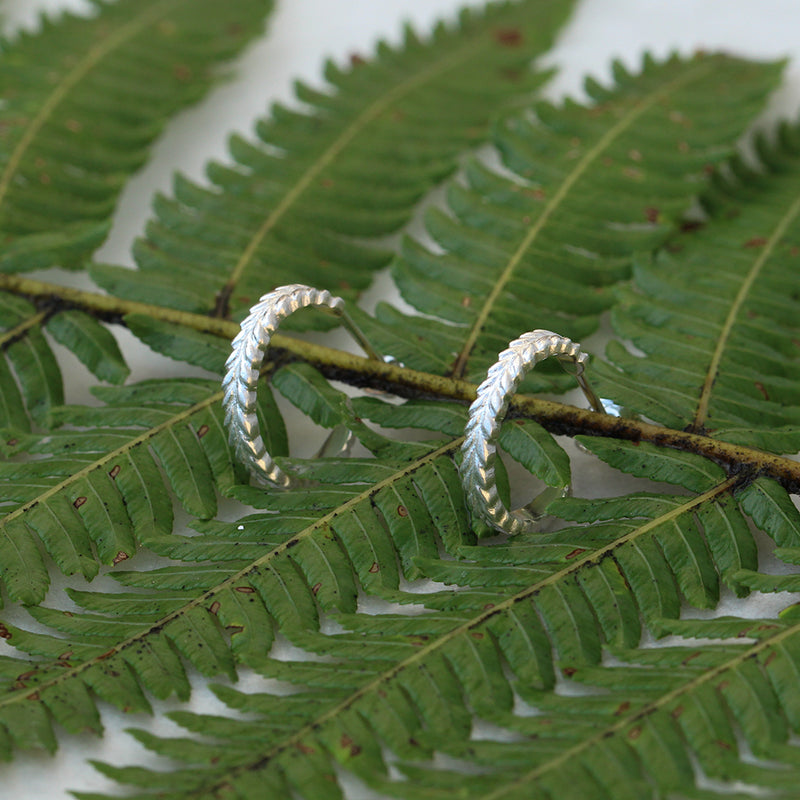 Silver fern hoop earrings in sterling silver