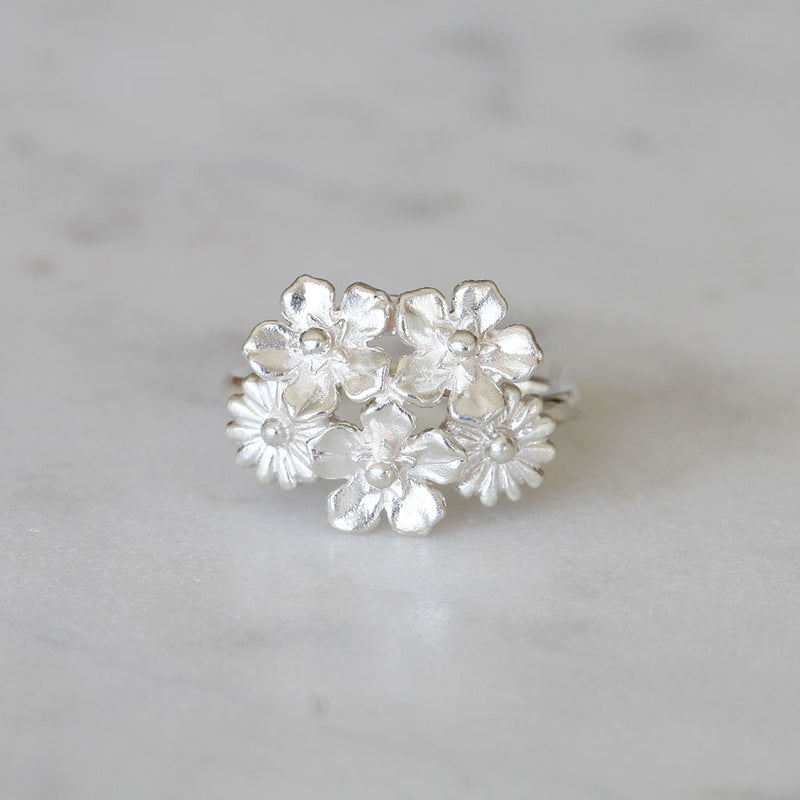 small flower bouquet ring in silver