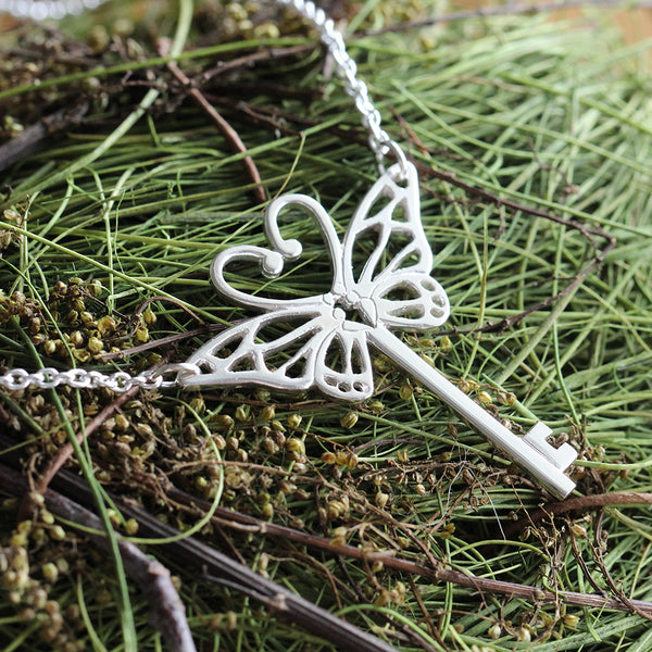 butterfly key necklace silver