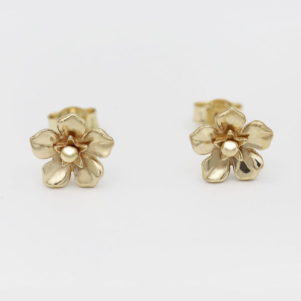 forget me not earrings in gold