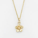 forget me not necklace in gold