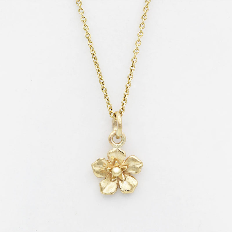 forget me not necklace in gold