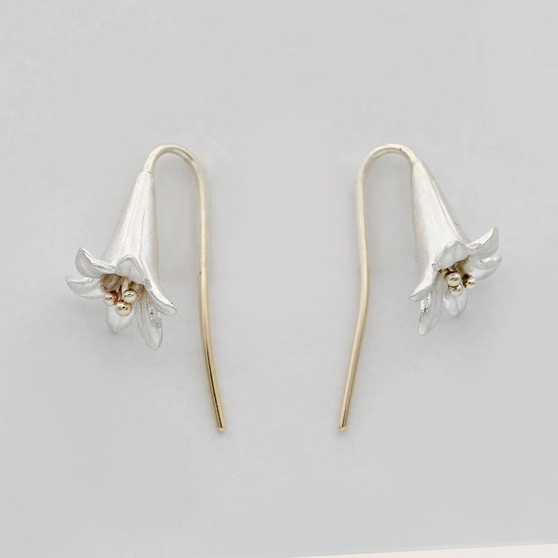 lily earrings in gold and silver