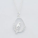 silver tui bird necklace
